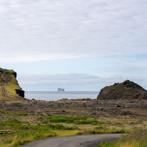 Eldey volcanic island (far middle)